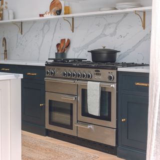 Shaker navy kitchen with stainless steel range cooker