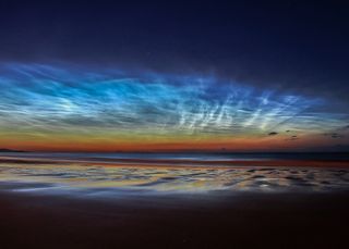 "Sunderland Noctilucent Cloud Display," the runner up in the skyscapes category in the Royal Observatory's annual Insight Astronomy Photographer of the Year competition. Taken July 7, 2014 at Seaburn Beach, Sunderland, UK.
