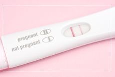 How early on can you take a pregnancy test, white testing stick on pink background