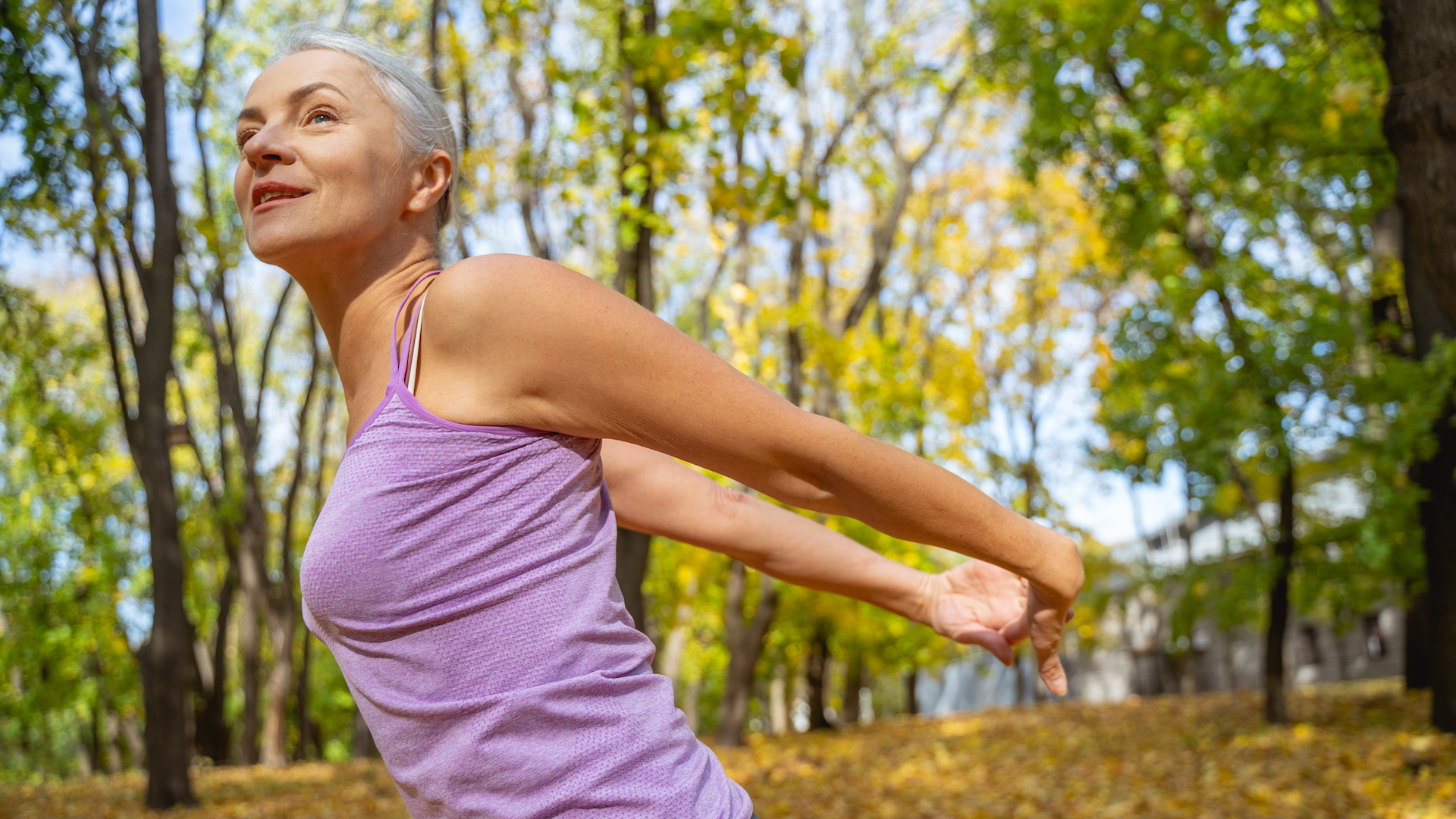 Woman stretching while out for a walk