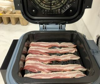 Five strips of bacon on the Ninja Speedi Rapid Cooker and Air Fryer.