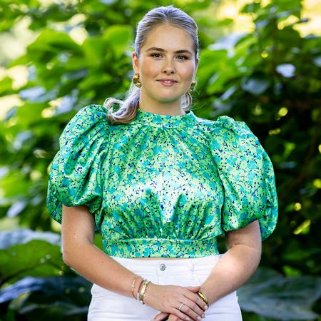 Princess Catharina-Amalia wearing a green top and white jeans