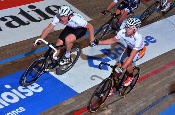 Shane Archbold is a face of concentration as he slingshots away from teammate Glen O'Shea