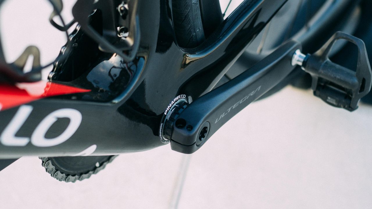 A red and black pinarello F road bike