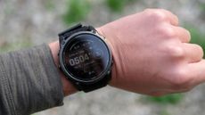 A close-up picture of our reviewer wearing the Garmin Enduro 3 smartwatch