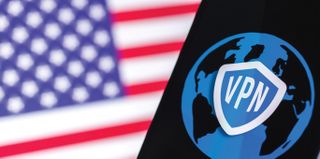 USA Privacy with VPN application in America. Flag and laptop on the background photo