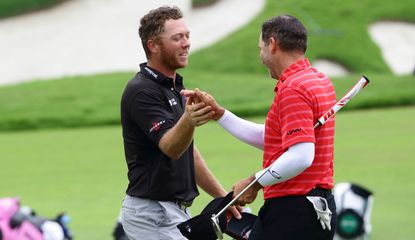 Talor Gooch shakes hands with Sergio Garcia after his playoff win