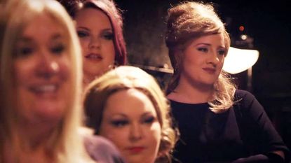 Adele amongst a group of Adele impersonators.