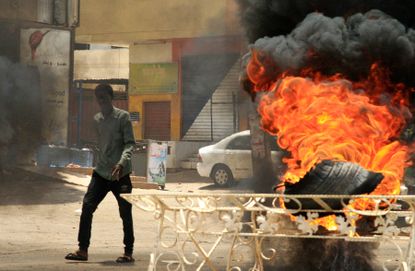 Sudanese protester near Khartoum&amp;#039;s army headquarters.