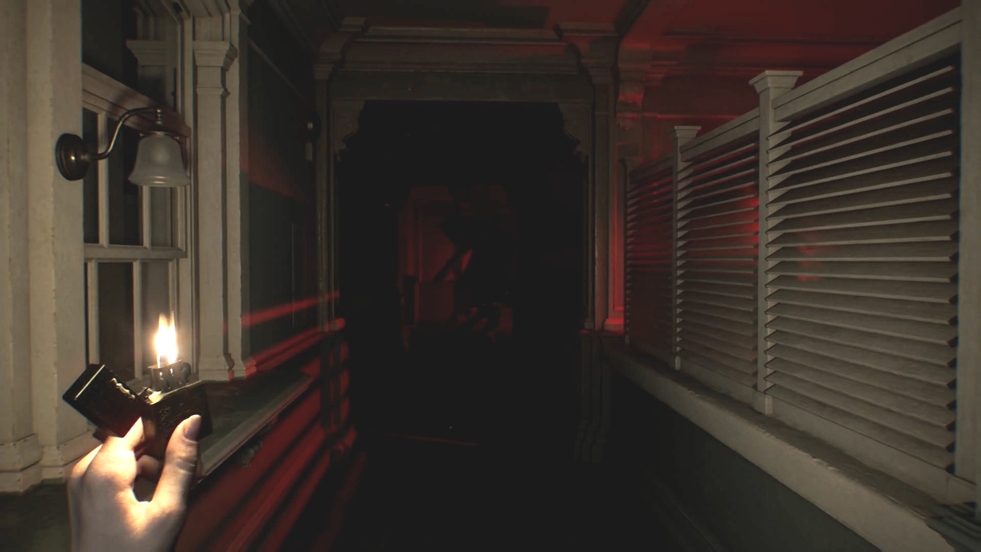 Resident Evil Requiem - the player holds a lighter in a dark hallway near the shadow ghost