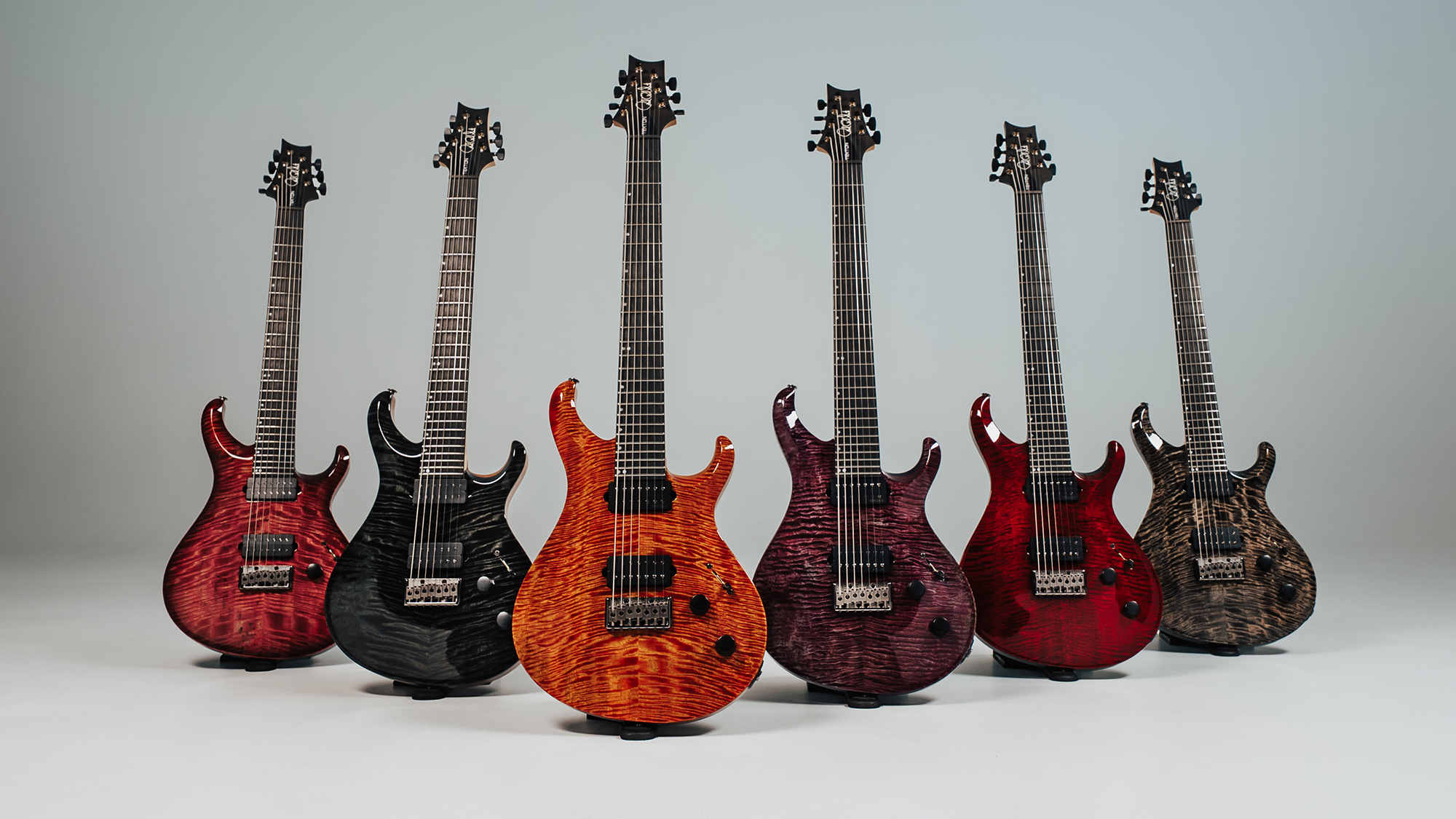 Four Tekton models boast stainless steel frets, radical body contours, and new humbuckers in a bid to shake up the metal guitar market