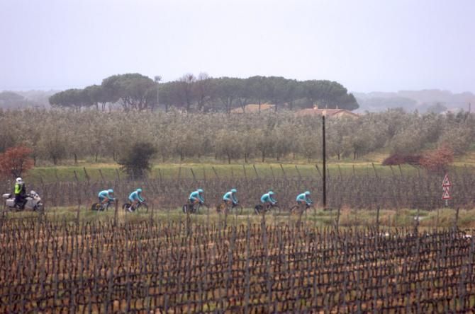 The Astana squad rolls through vineyards during the Tirreno-Adriatico team time trial.