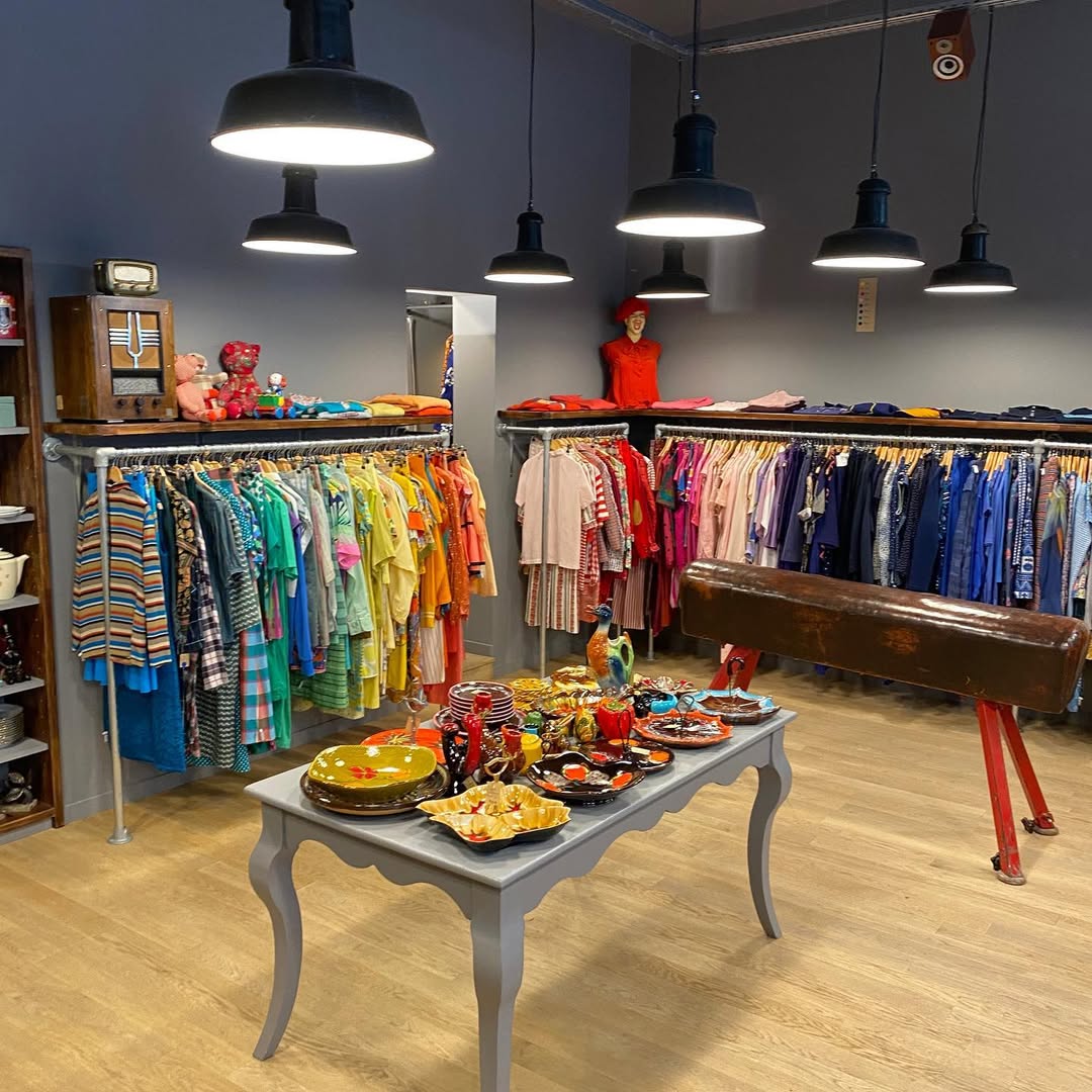 Clothing and jewelry displayed in Thanx God I'm a V.I.P., one of the best Paris vintage stores.