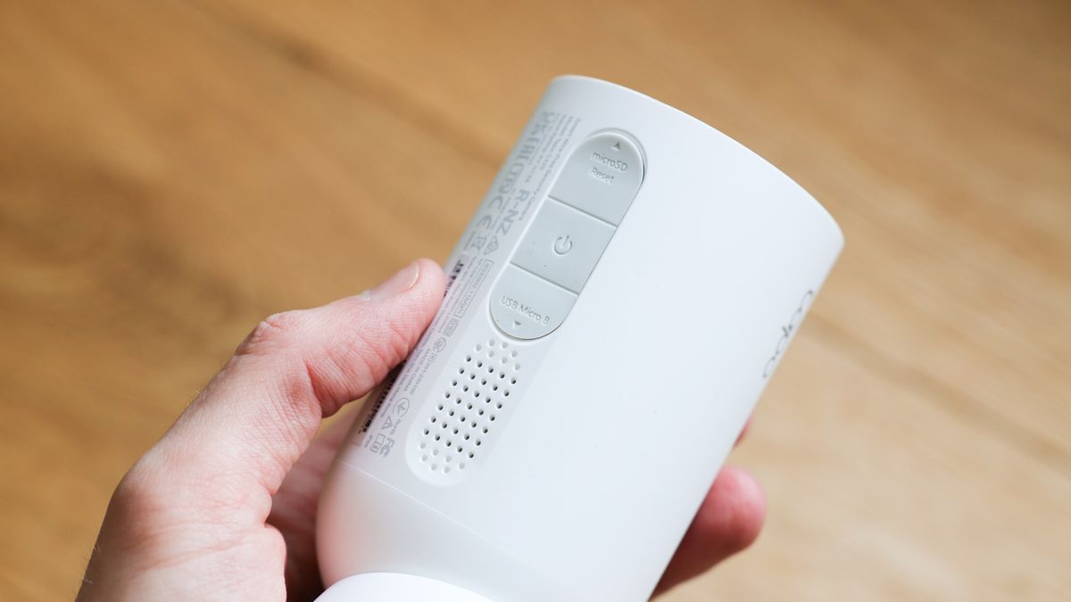 TP-Link Tapo C425 security camera held in a hand
