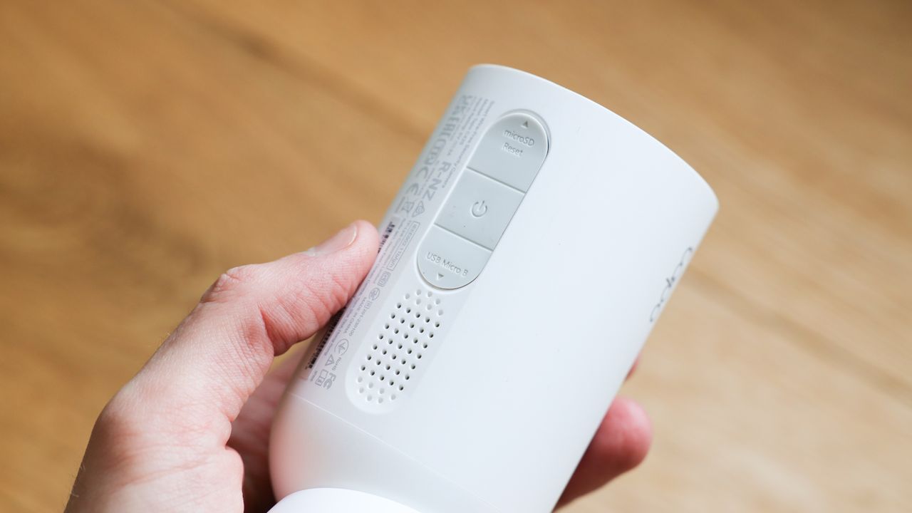 TP-Link Tapo C425 security camera held in a hand