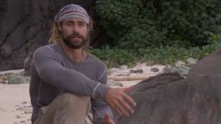 Jonathan Young in a confessional on the beach in Survivor 42