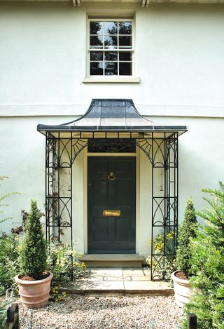 Georgian front door with metal porch