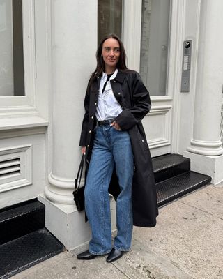 @livvperez wearing a shirt over a top with coat and jeans