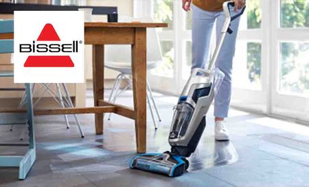 bissell logo top left with someone using a bissell hoover in the living room