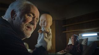 John Lithgow with a puppet and Geoffrey Rush in The Rule Of Jenny Pen