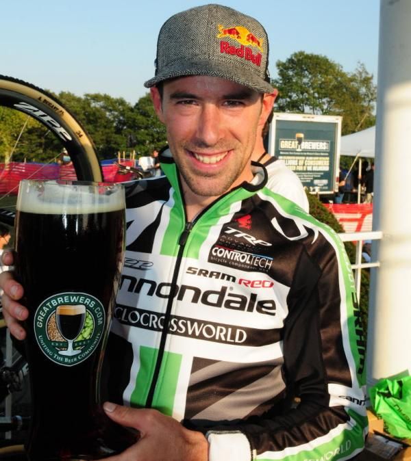 Tim Johnson enjoys his winners' beverage.