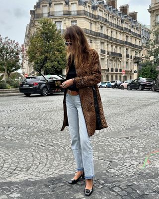 @estellepigault wearing leopard print coat with jeans