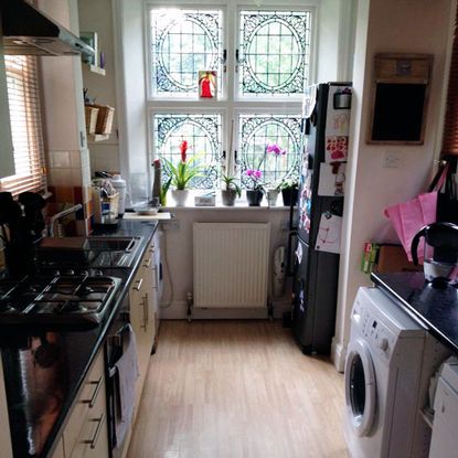 before kitchen with little storage and wooden flooring