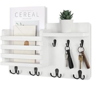 White wooden mail holder for wall with key hooks, letter sorter and floating shelf 