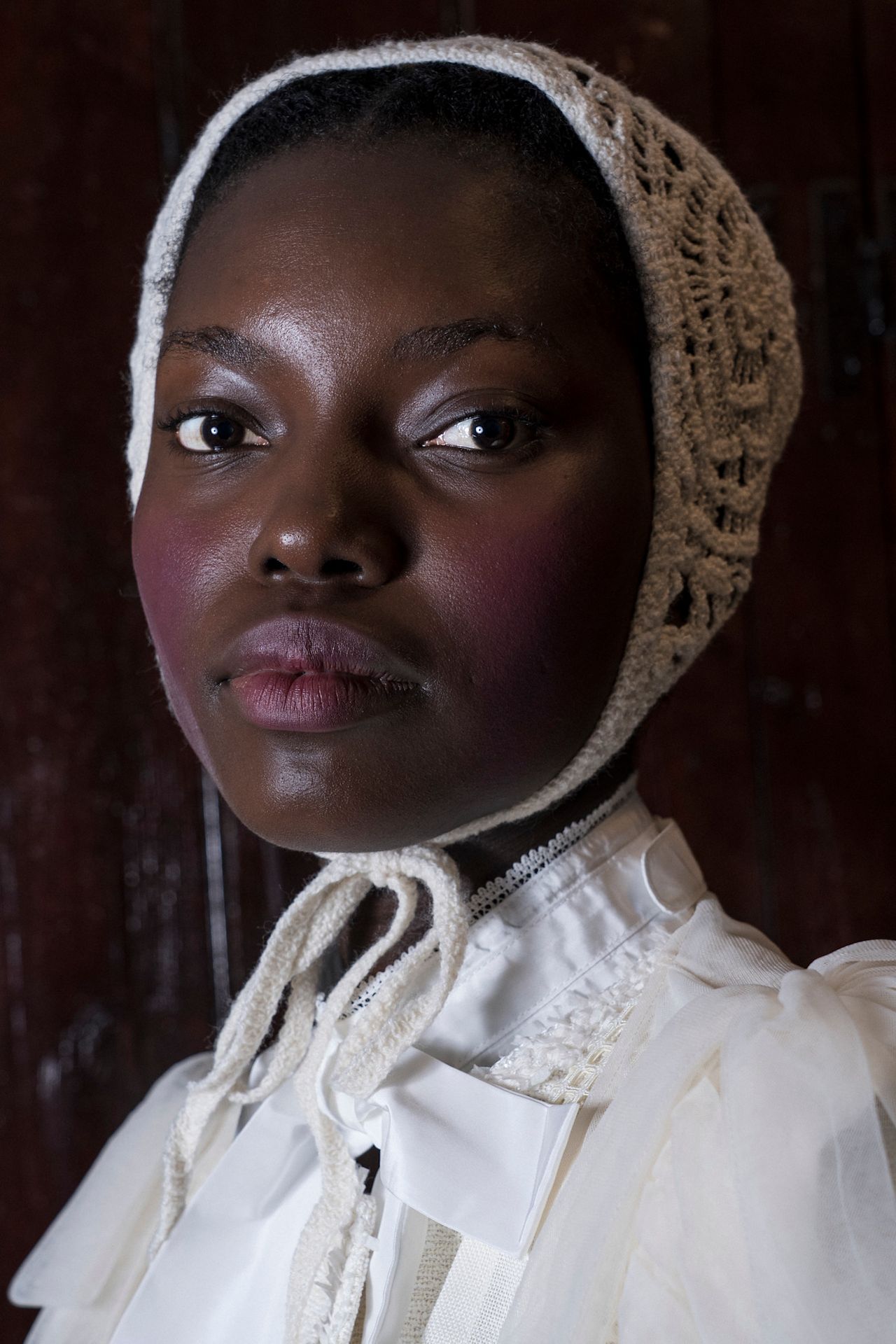 Various women with pops of color on their cheeks