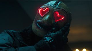 The Heart Eyes killer with their glowing red eyes