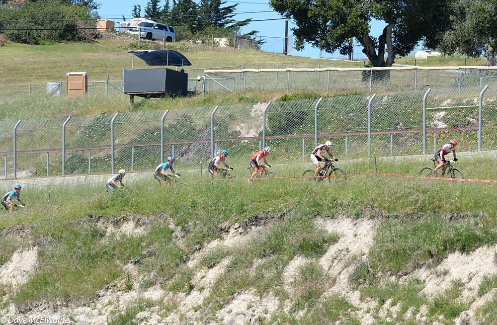 Riders at the top of the only climb