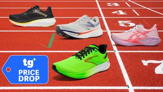 Four running sneakers shown on a track