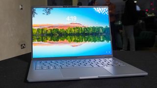 Asus Zenbook A14 on a table with the display on at CES 2025