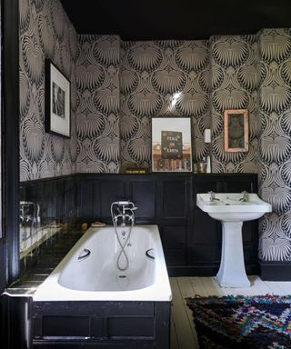 Black bathroom with wallpaper