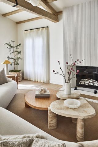 Neutral living room with fluted fireplace