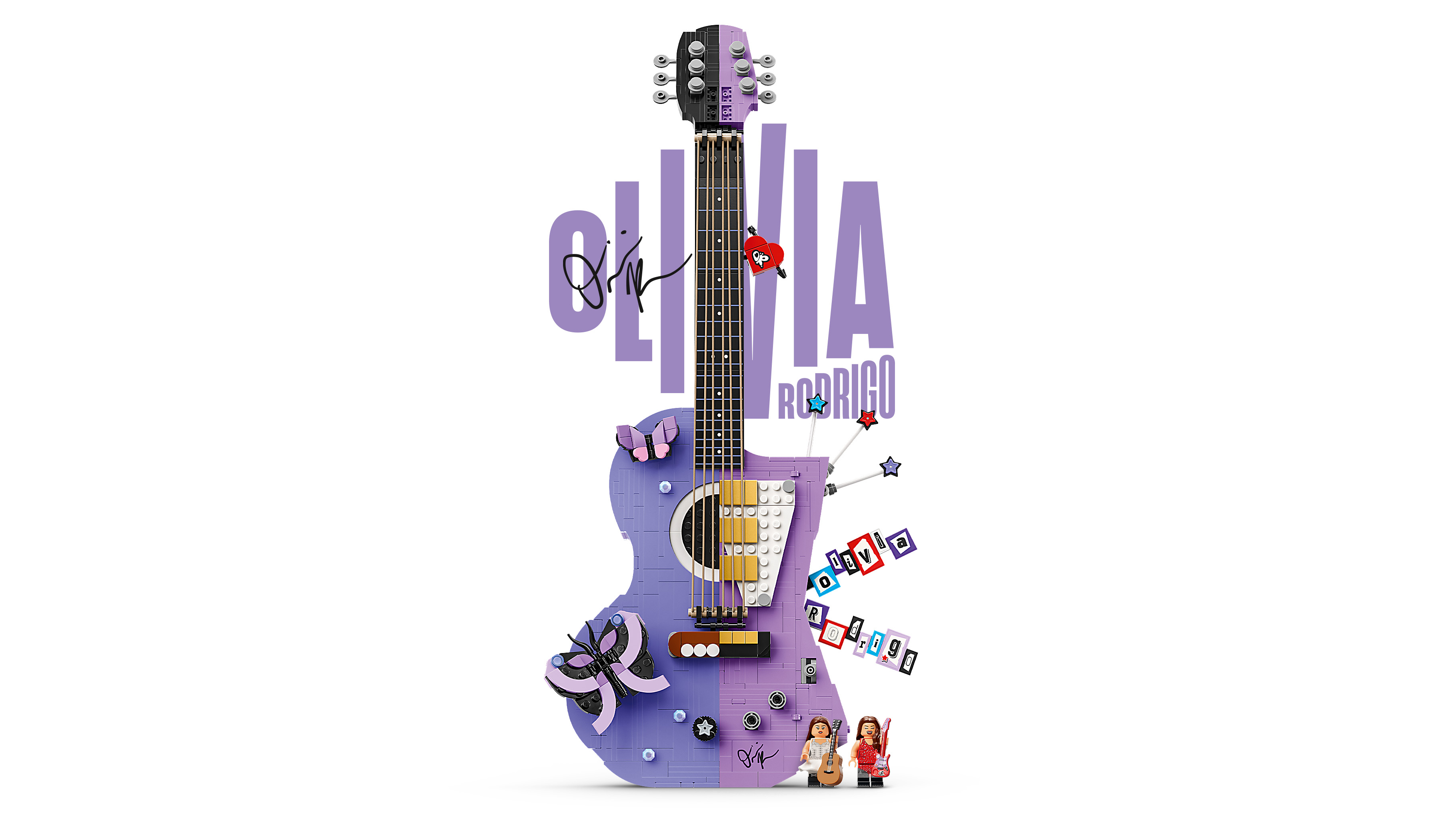 Product shot of the Lego Dual Guitar set against a white background, split into purple and lilac halves, decorated with butterflies and stars, with two minifigures and the Olivia Rodrigo logo alongside it.