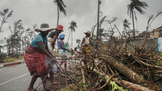 Locals clear tree debris from roads in Madagascar