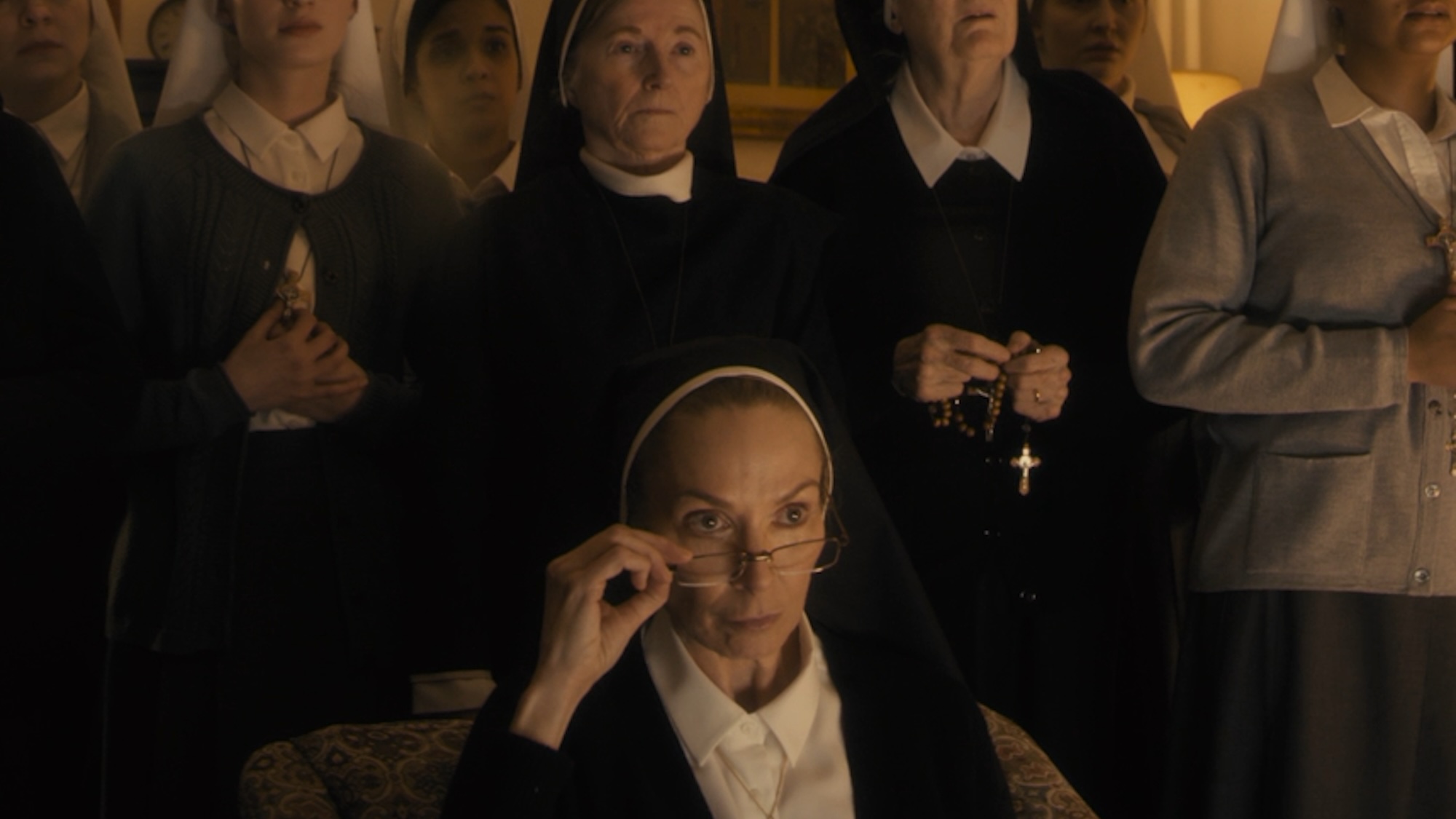 The nuns watching the broadcast in Disclosure Day