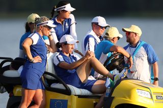 Team Europe sat on a cart watching the Solheim Cup