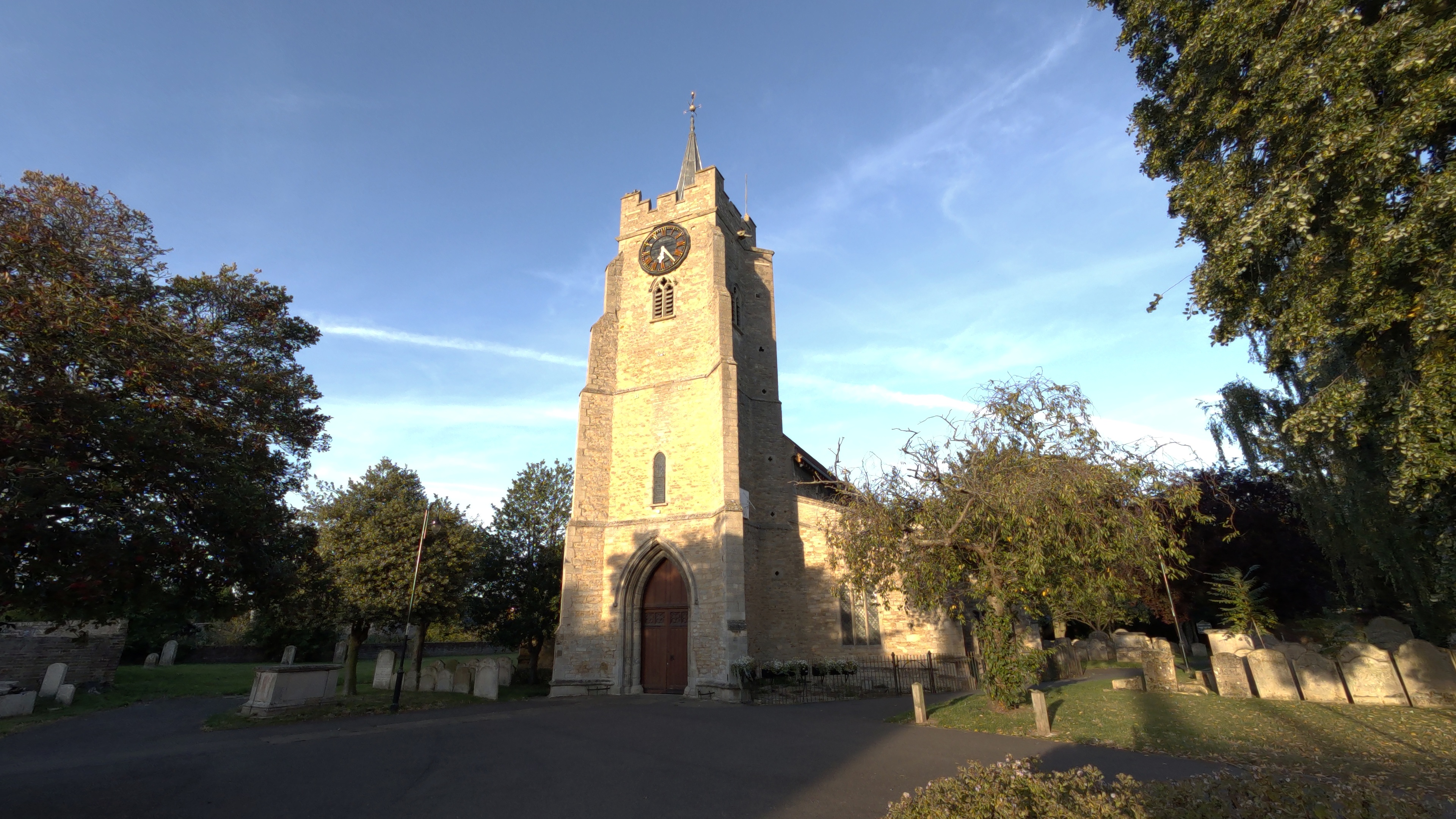 An old stone church shot in a churchyard shot on a Kandao QooCam 3 Ultra 360 camera