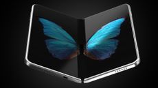A concept image of a folding phone with a picture of a butterfly's wings spread across the two halves of the screen