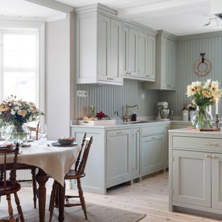 pale blue christmas kitchen with open plan dining area