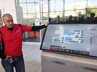 Frank Alaimo, UNLV senior audio visual systems specialist, with Visix’s interactive wayfinding solution.