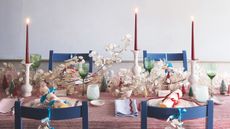 Christmas table setting with red, blue and white theme