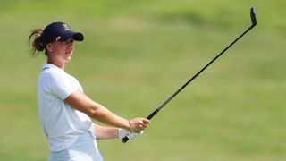 Linn Grant playing a fairway wood shot