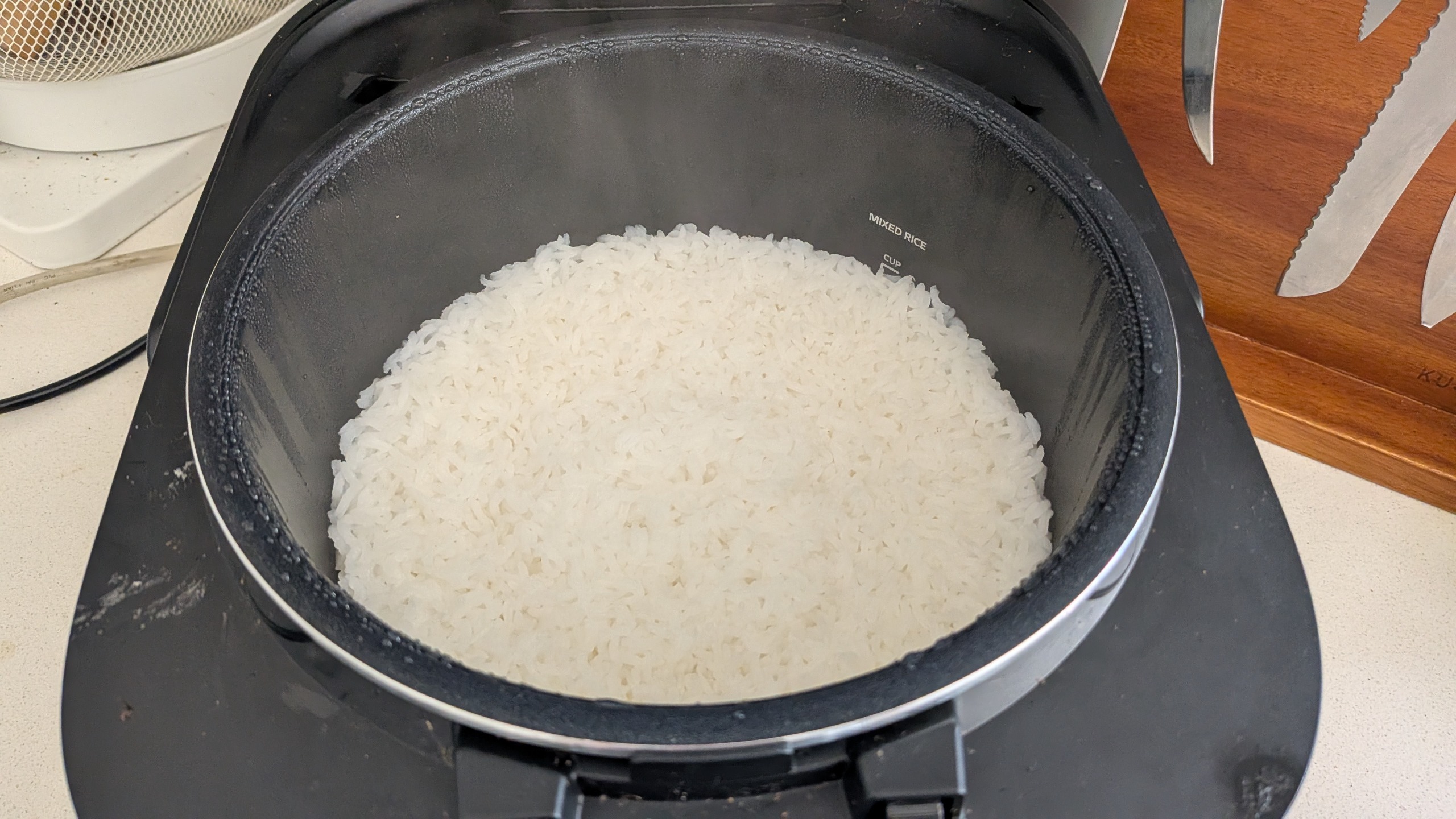 Midea 5L Induction Rice Cooker with some freshly cooked Jasmine rice