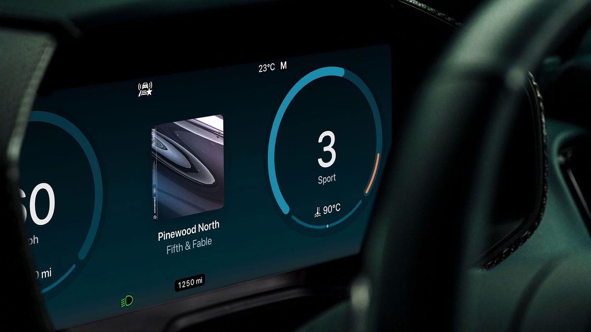 The interior of an Aston Martin car showing Apple CarPlay Ultra