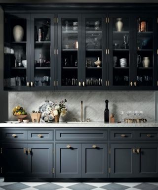 Dark charcoal kitchen cabinets in a luxury kitchen
