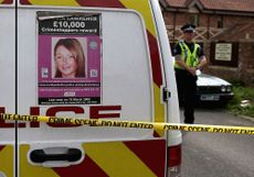 Missing poster of Claudia Lawrence and police tape