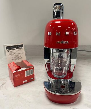 Setting up the Smeg Lavazza A Modo Mio with glass and capsules